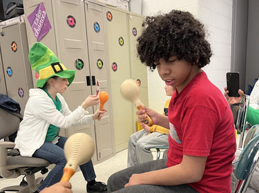 Students in a classroom playihng