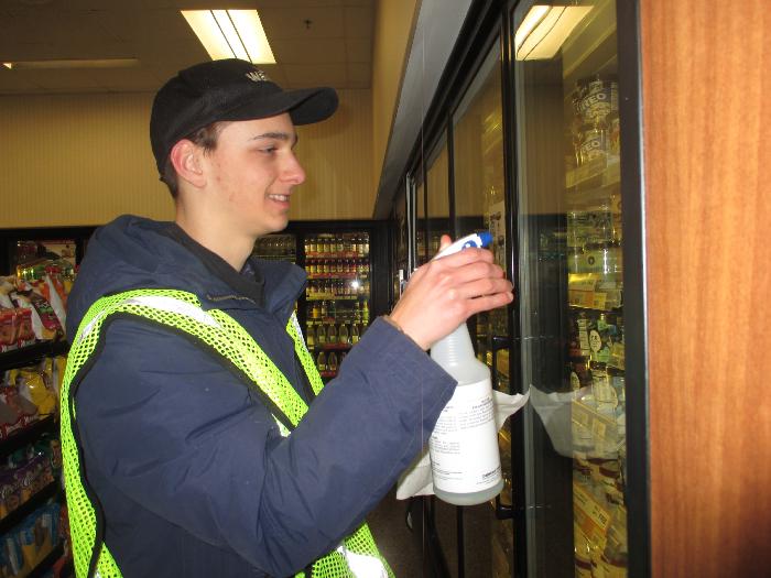 Networks students cleaning glass