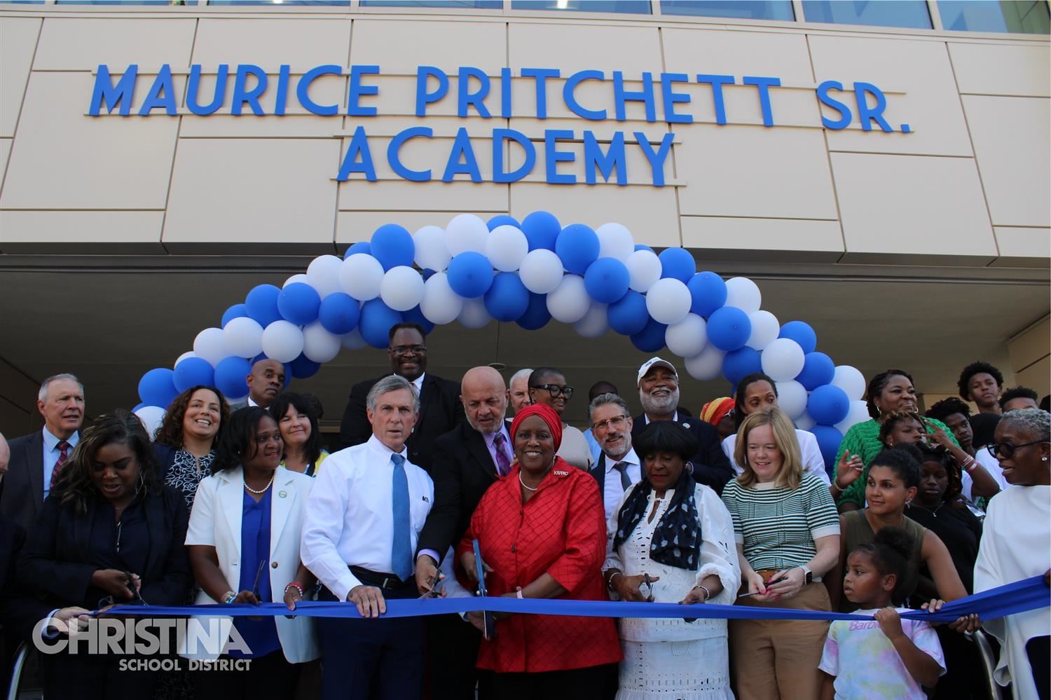 Photo of Gov. Carney, Mrs. Pritchett, Dr. Joyner & distinquished guest at ribbon cutting ceremony.