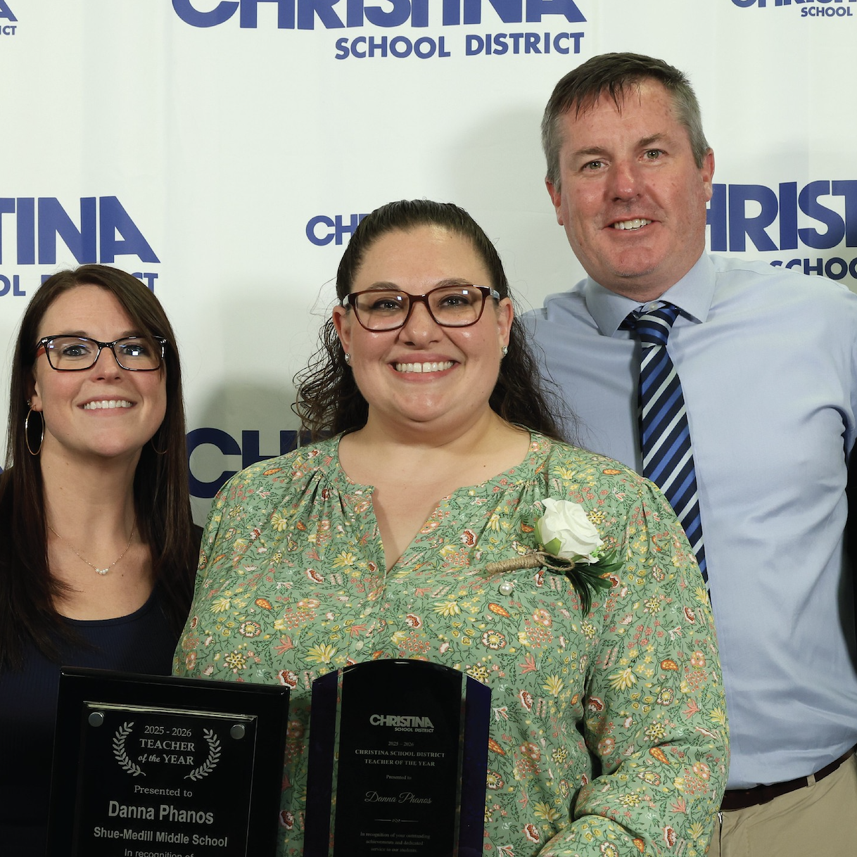 Shue-Medill Middle School Teacher of the Year Danna Phanos standing with SMMS Administrators