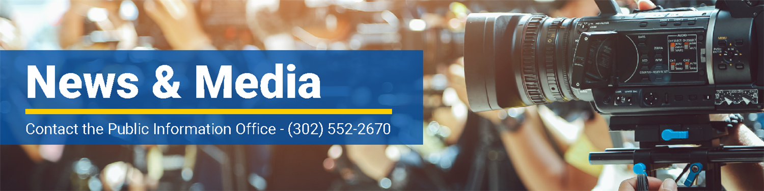 close up of media camera with overlay text that says 'News & Media. Contact the Public Information Office 302-552-2670'.