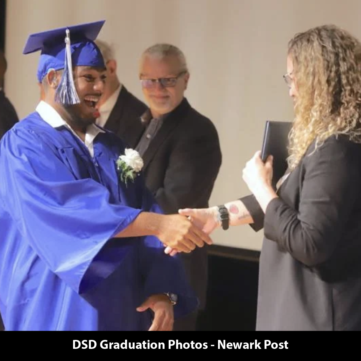 DSD graduate receiving diploma