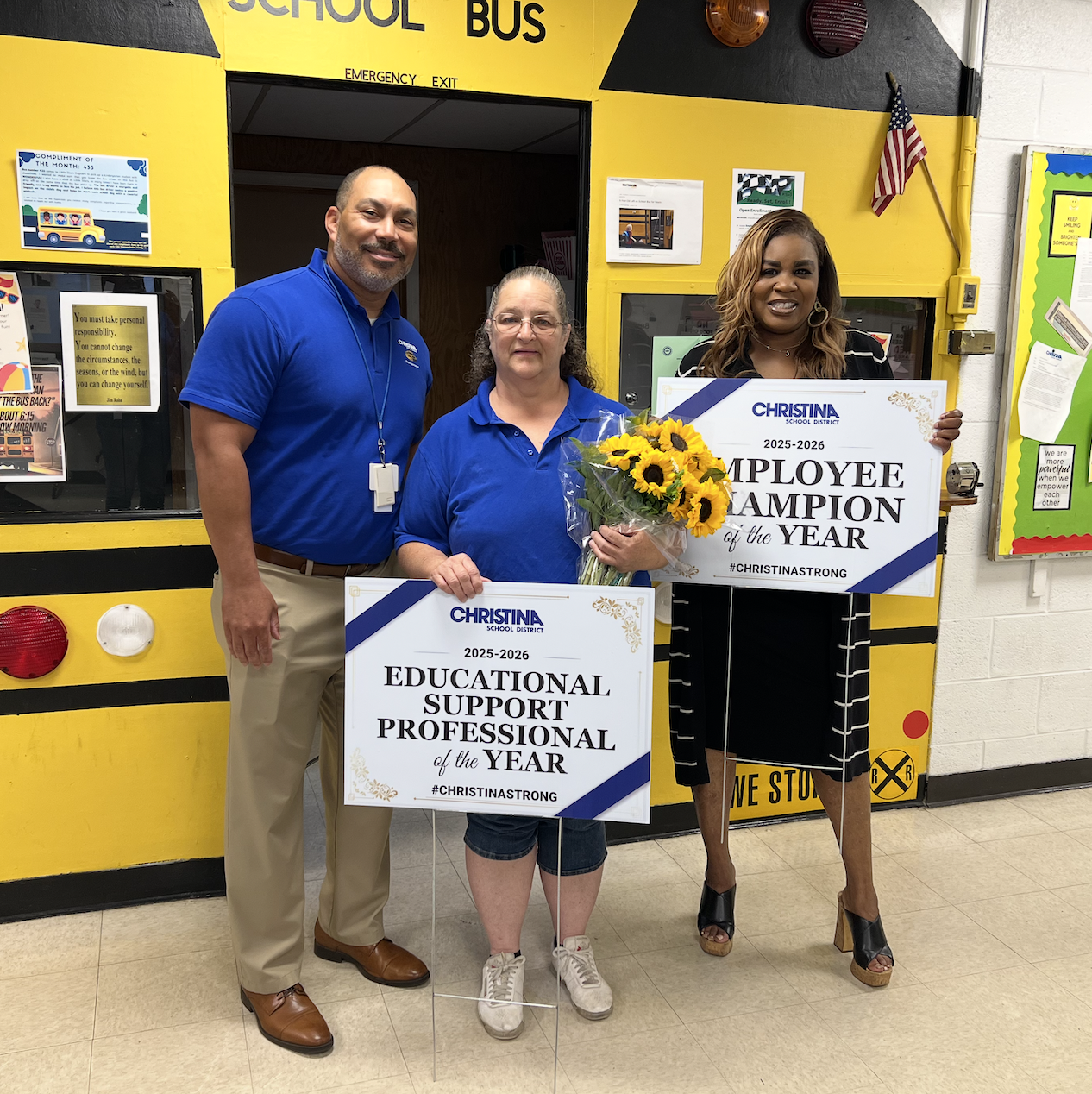  Elizabeth Willis standing with her Supervisor Mario Cromartie and Deputy Superintendent Dr. Joyner