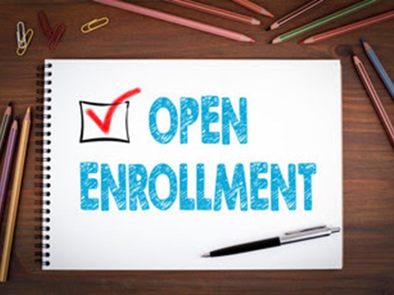Close up of a notebook on a desk - Open Enrollment