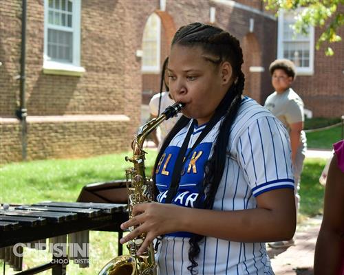 Student from the Bayard Borchestra performing at Newark Community Day