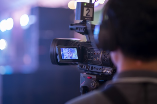  Closeup of journalist video recording an event